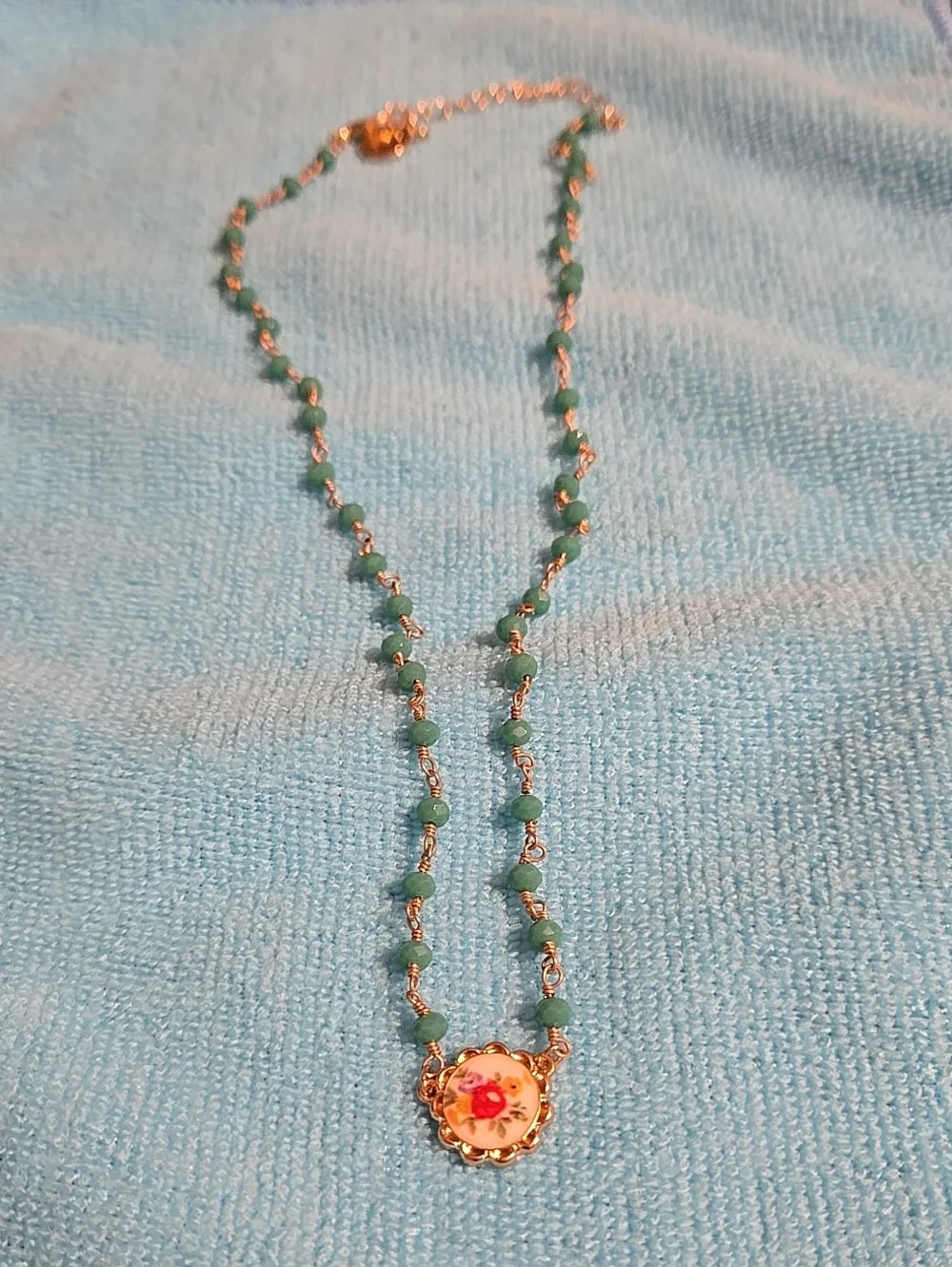 NWT Plunder Gold-Tone Necklace with Green Beads and Floral Pendant